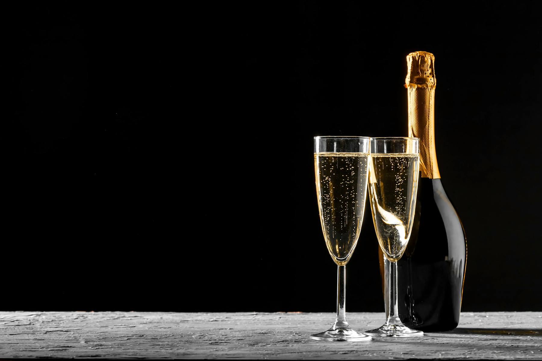 Flutes of champagne and bottle of champagne